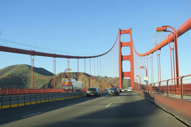 Driving north across the Golden Gate Bridge in San Francisco, California, on a clear day