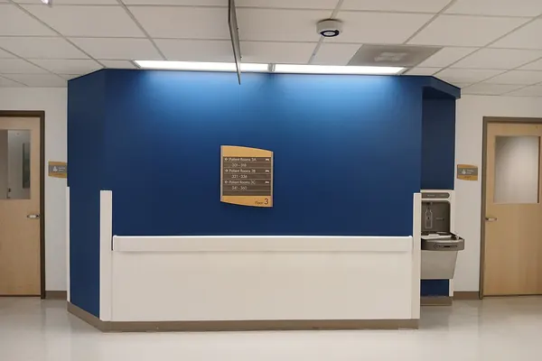 Hospital hallway with a reception desk at Inova Mount Vernon Hospital, Virginia