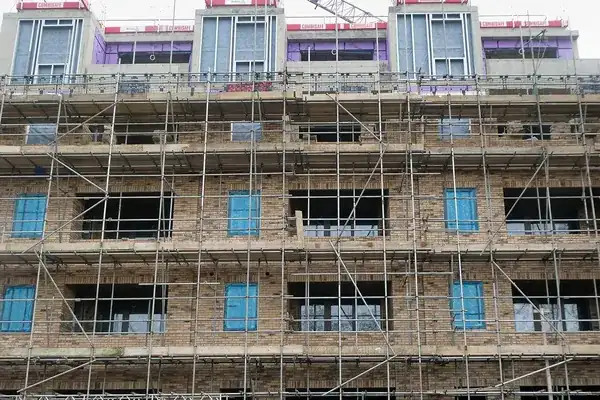 Housing construction site with scaffolding in Tottenham, London