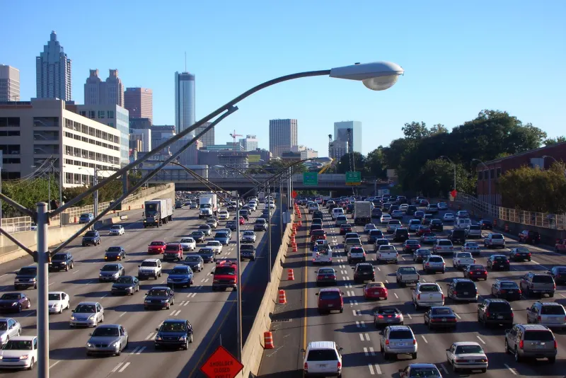 Traffic on the Downtown Connector (I-75/I-85) heading toward the Atlanta skyline in Georgia
